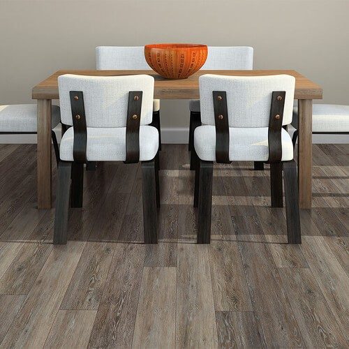 Dark wood vinyl plank under dining room table